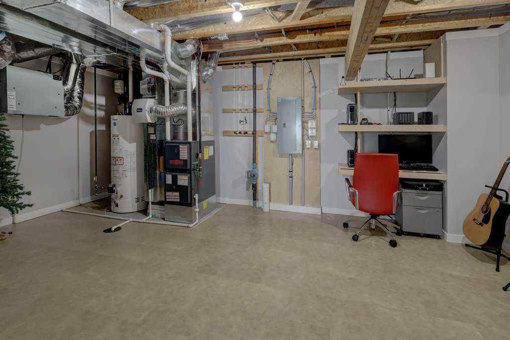 MLS® A2246078 - 2084 Ravensdun Crescent SE in Ravenswood Airdrie, Residential