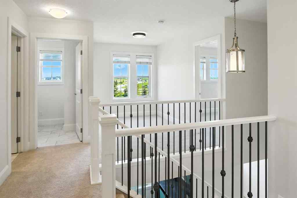 MLS® A2246079 - 85 Cattail Run  in Harmony Rural Rocky View County, Residential