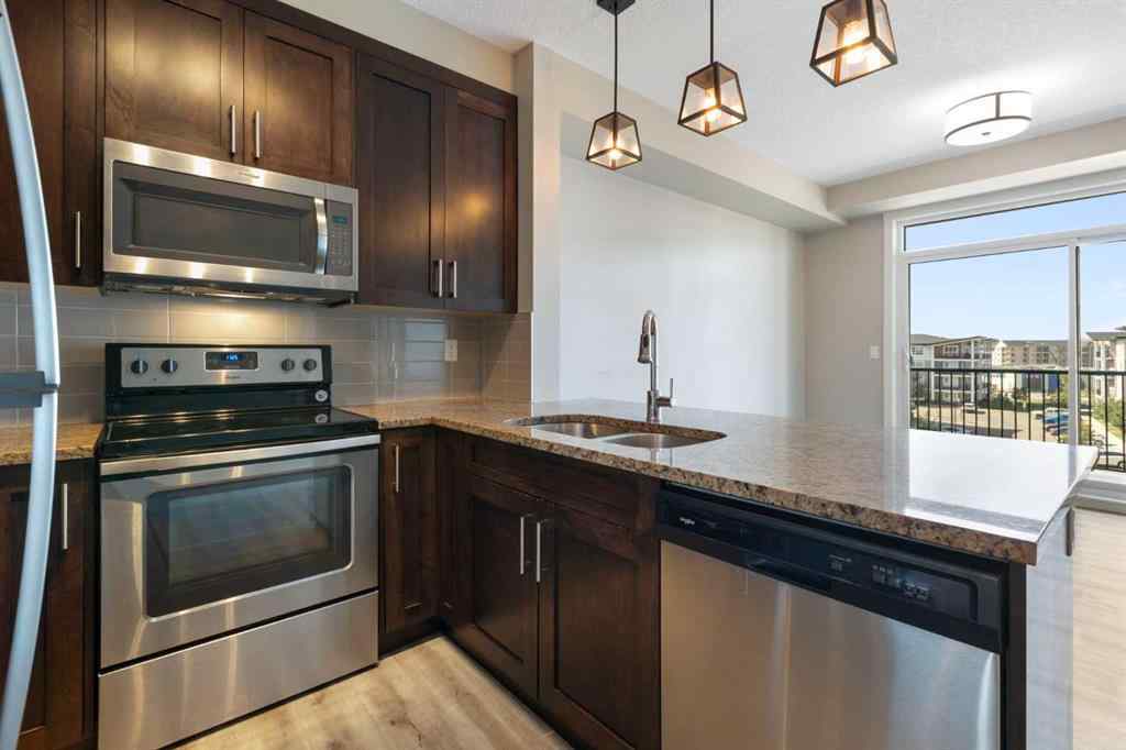 MLS® A2246081 - Unit #406 10 Walgrove Walk SE in Walden Calgary, Residential