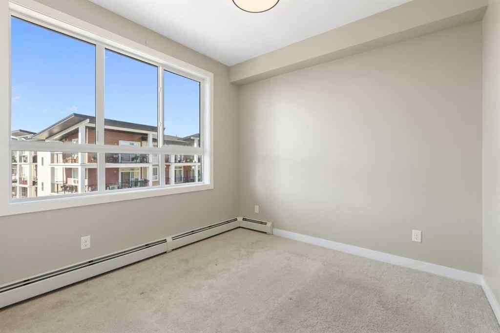 MLS® A2246081 - Unit #406 10 Walgrove Walk SE in Walden Calgary, Residential