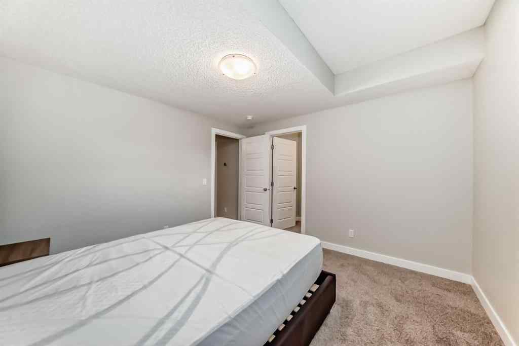 MLS® A2246083 - 221 Midgrove Mews SW in Midtown Airdrie, Residential