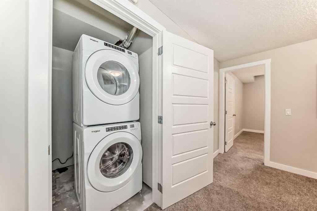 MLS® A2246083 - 221 Midgrove Mews SW in Midtown Airdrie, Residential