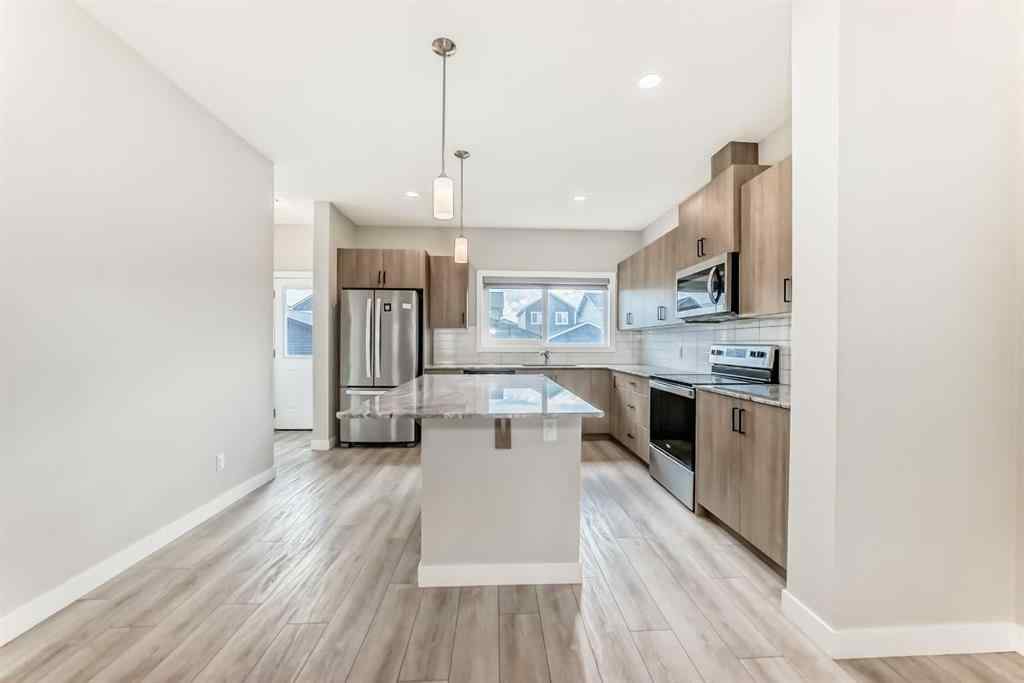 MLS® A2246083 - 221 Midgrove Mews SW in Midtown Airdrie, Residential