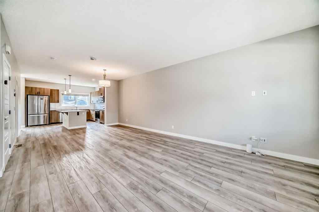 MLS® A2246083 - 221 Midgrove Mews SW in Midtown Airdrie, Residential