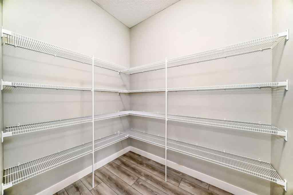 MLS® A2246083 - 221 Midgrove Mews SW in Midtown Airdrie, Residential