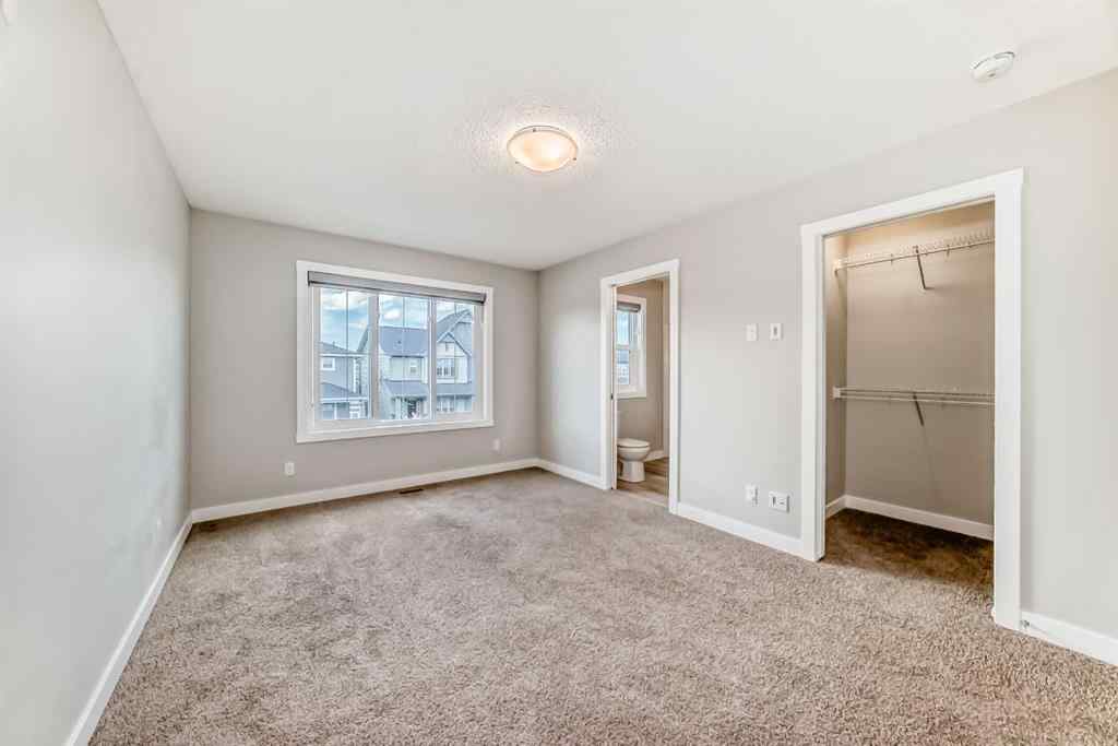 MLS® A2246083 - 221 Midgrove Mews SW in Midtown Airdrie, Residential
