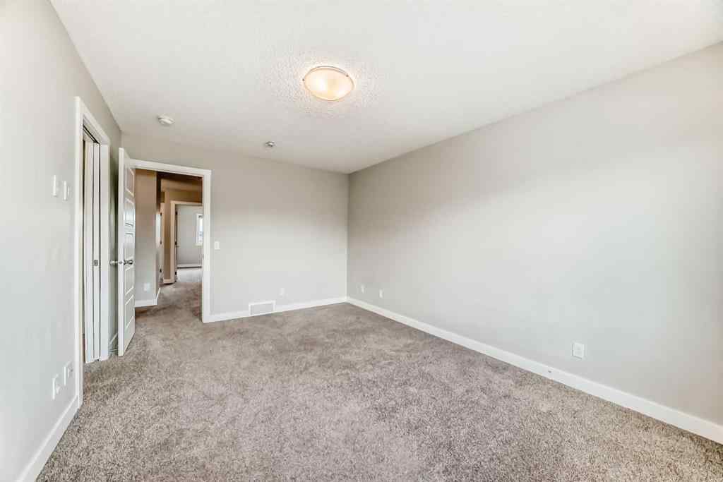 MLS® A2246083 - 221 Midgrove Mews SW in Midtown Airdrie, Residential