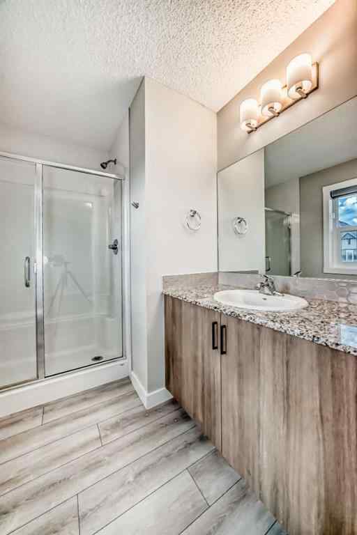 MLS® A2246083 - 221 Midgrove Mews SW in Midtown Airdrie, Residential