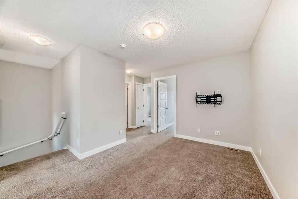 MLS® A2246083 - 221 Midgrove Mews SW in Midtown Airdrie, Residential