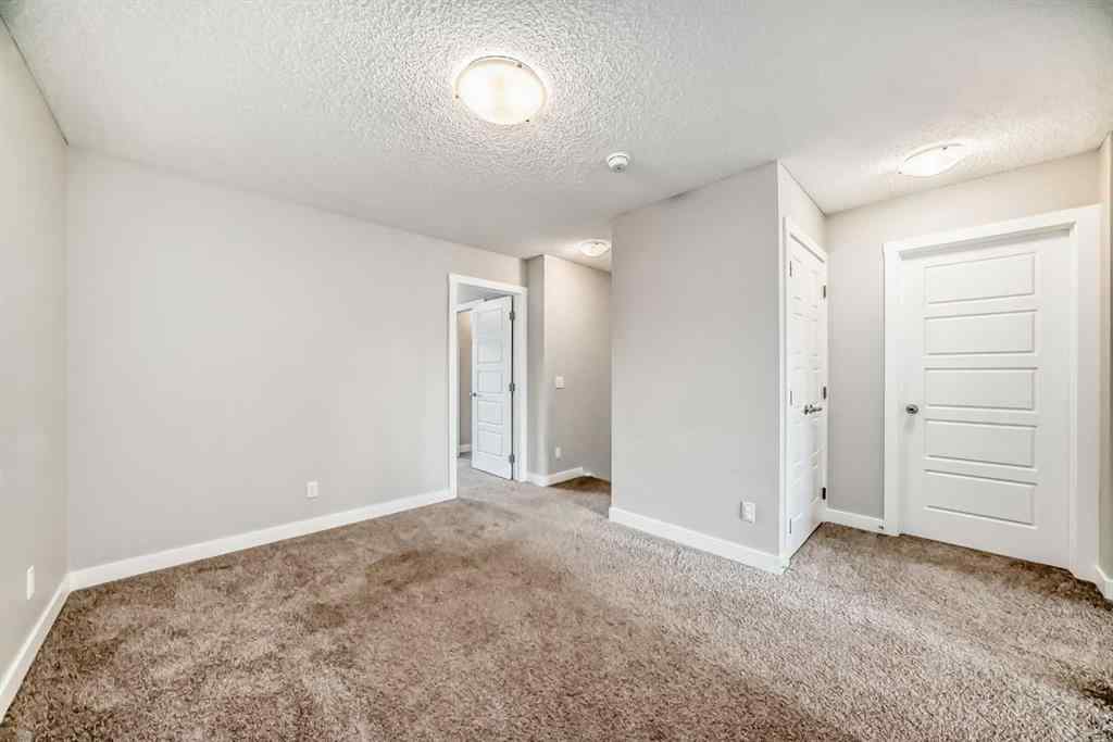 MLS® A2246083 - 221 Midgrove Mews SW in Midtown Airdrie, Residential