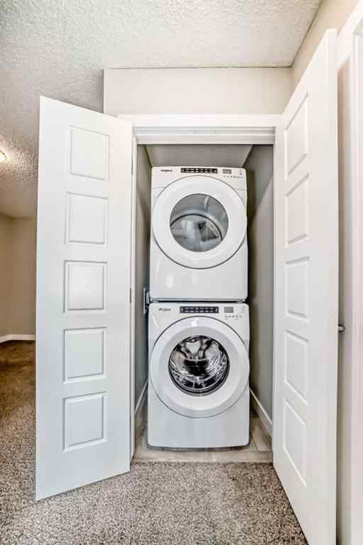 MLS® A2246083 - 221 Midgrove Mews SW in Midtown Airdrie, Residential
