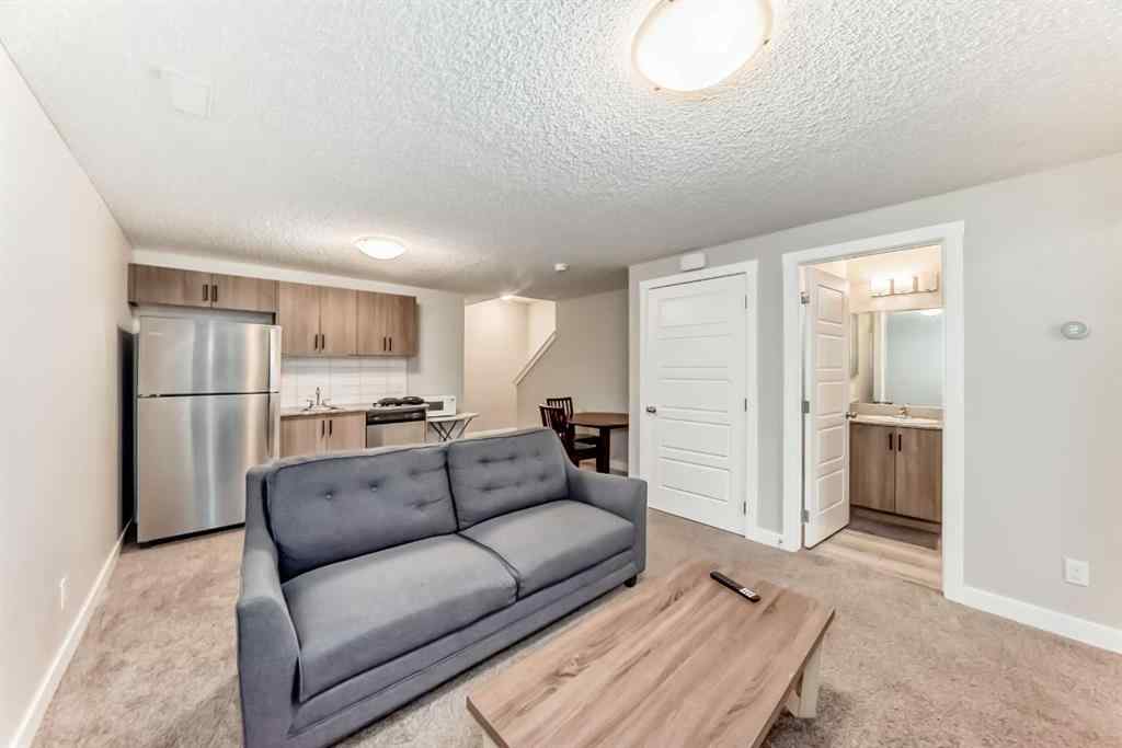 MLS® A2246083 - 221 Midgrove Mews SW in Midtown Airdrie, Residential