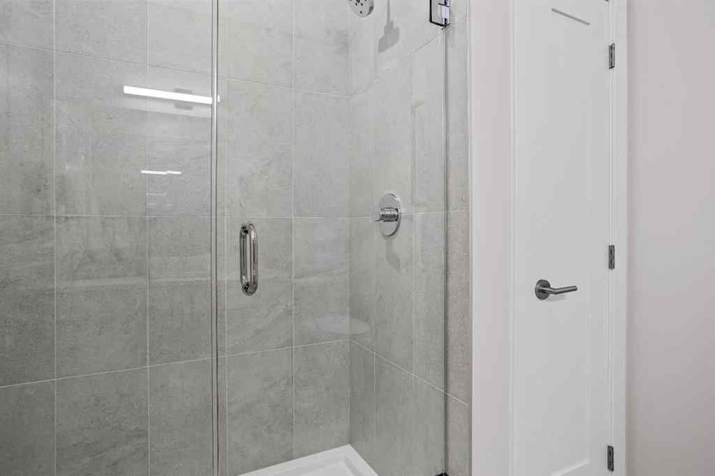 MLS® A2246086 - Unit #101L 209 Stewart Creek Rise  in Three Sisters Canmore, Residential