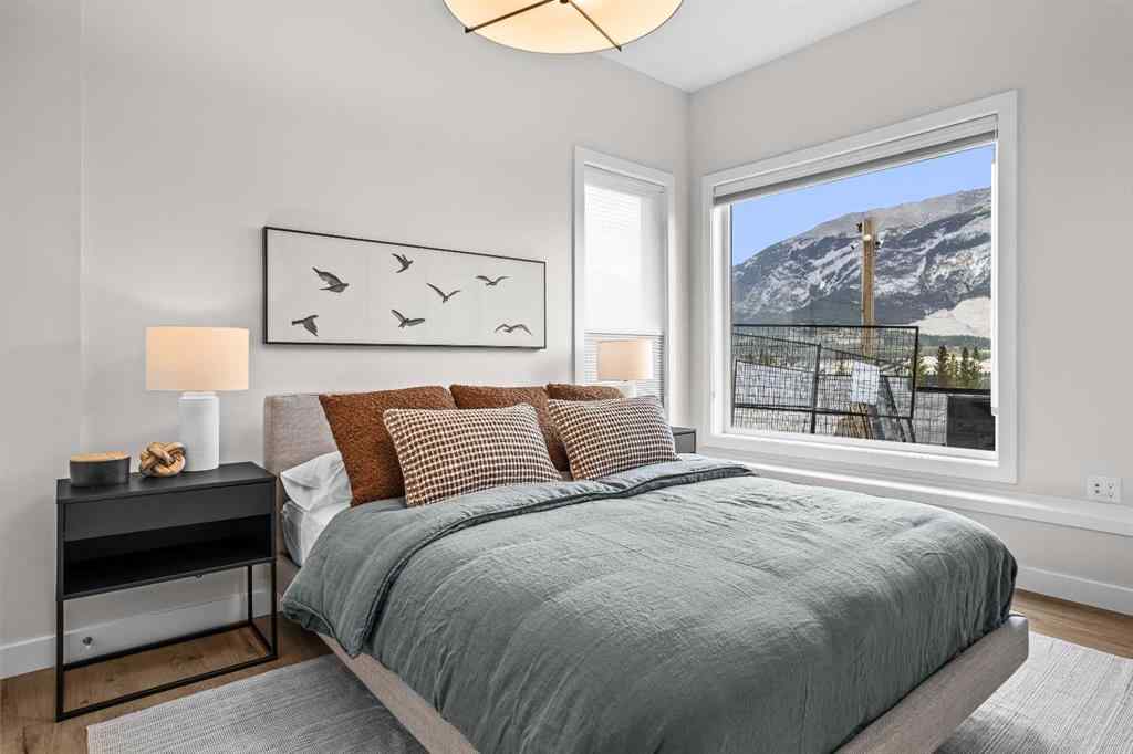 MLS® A2246086 - Unit #101L 209 Stewart Creek Rise  in Three Sisters Canmore, Residential