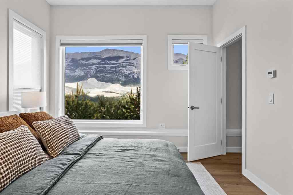 MLS® A2246086 - Unit #101L 209 Stewart Creek Rise  in Three Sisters Canmore, Residential