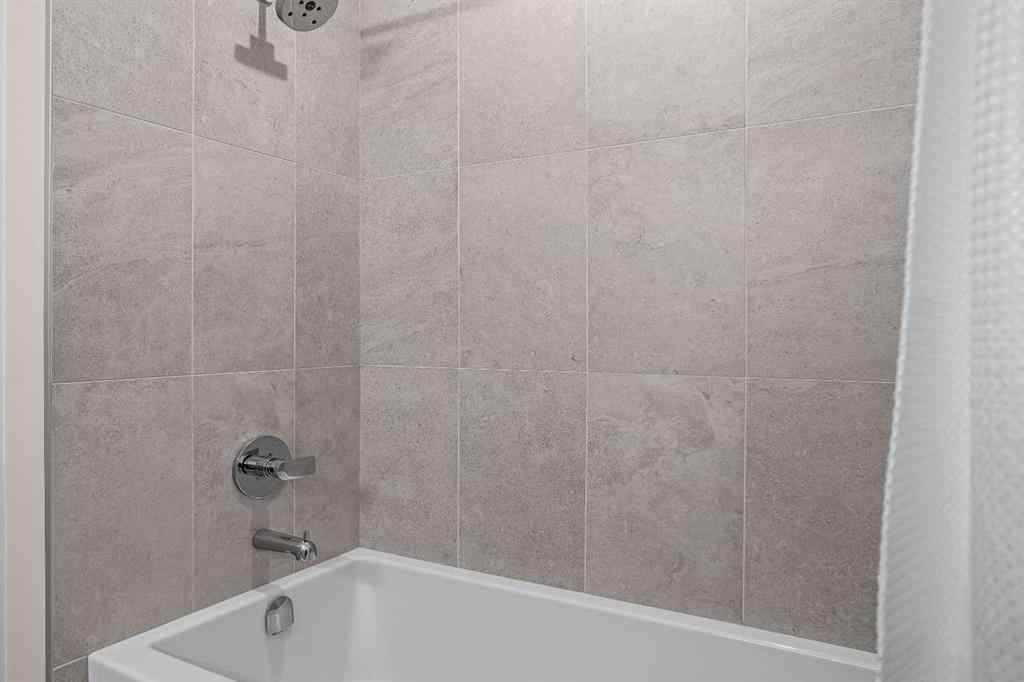 MLS® A2246086 - Unit #101L 209 Stewart Creek Rise  in Three Sisters Canmore, Residential
