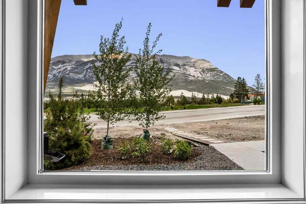 MLS® A2246086 - Unit #101L 209 Stewart Creek Rise  in Three Sisters Canmore, Residential