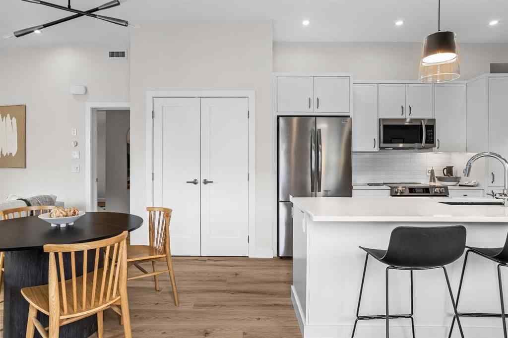 MLS® A2246086 - Unit #101L 209 Stewart Creek Rise  in Three Sisters Canmore, Residential