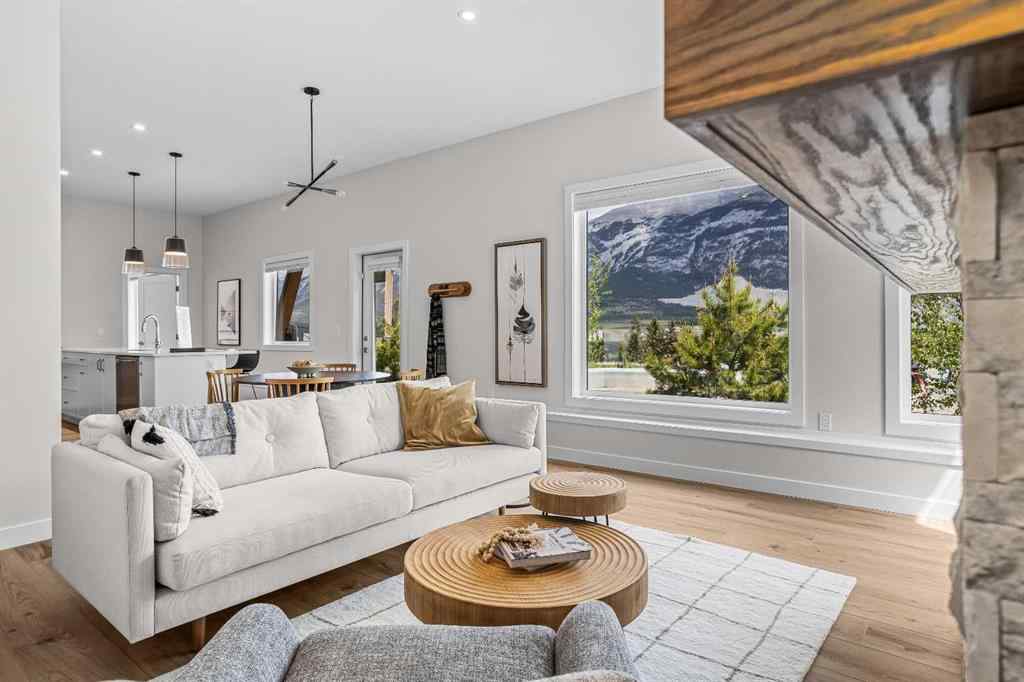MLS® A2246086 - Unit #101L 209 Stewart Creek Rise  in Three Sisters Canmore, Residential