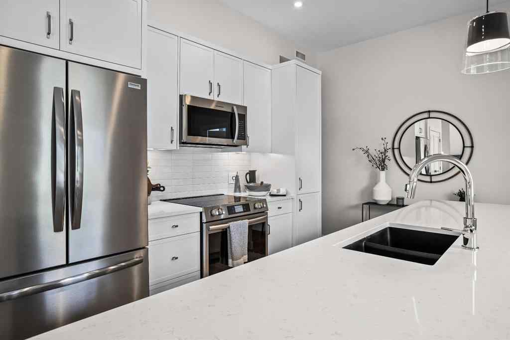 MLS® A2246086 - Unit #101L 209 Stewart Creek Rise  in Three Sisters Canmore, Residential