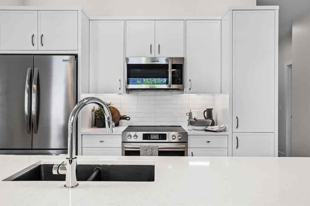 MLS® A2246086 - Unit #101L 209 Stewart Creek Rise  in Three Sisters Canmore, Residential