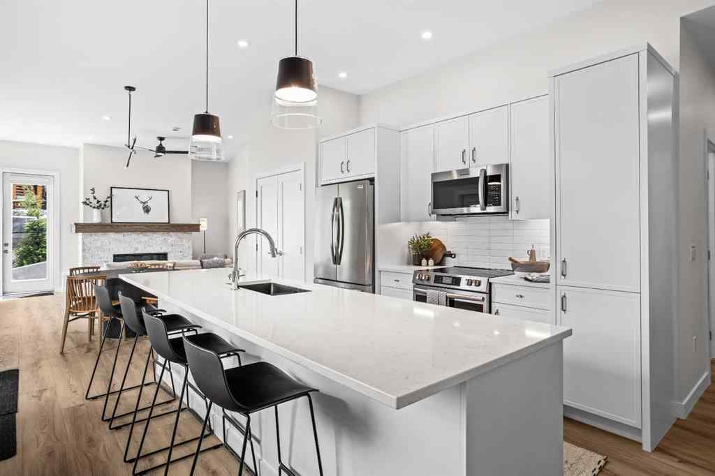 MLS® A2246086 - Unit #101L 209 Stewart Creek Rise  in Three Sisters Canmore, Residential