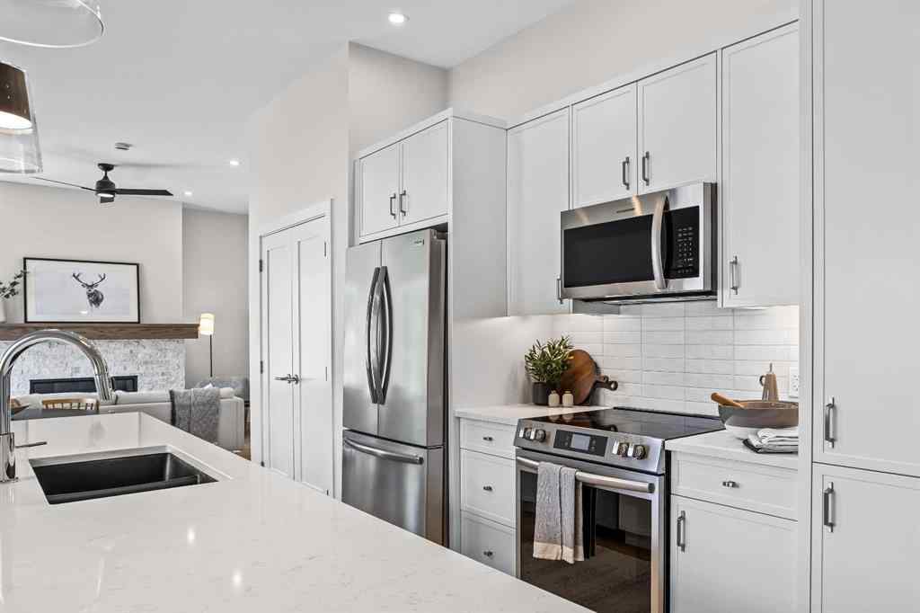 MLS® A2246086 - Unit #101L 209 Stewart Creek Rise  in Three Sisters Canmore, Residential