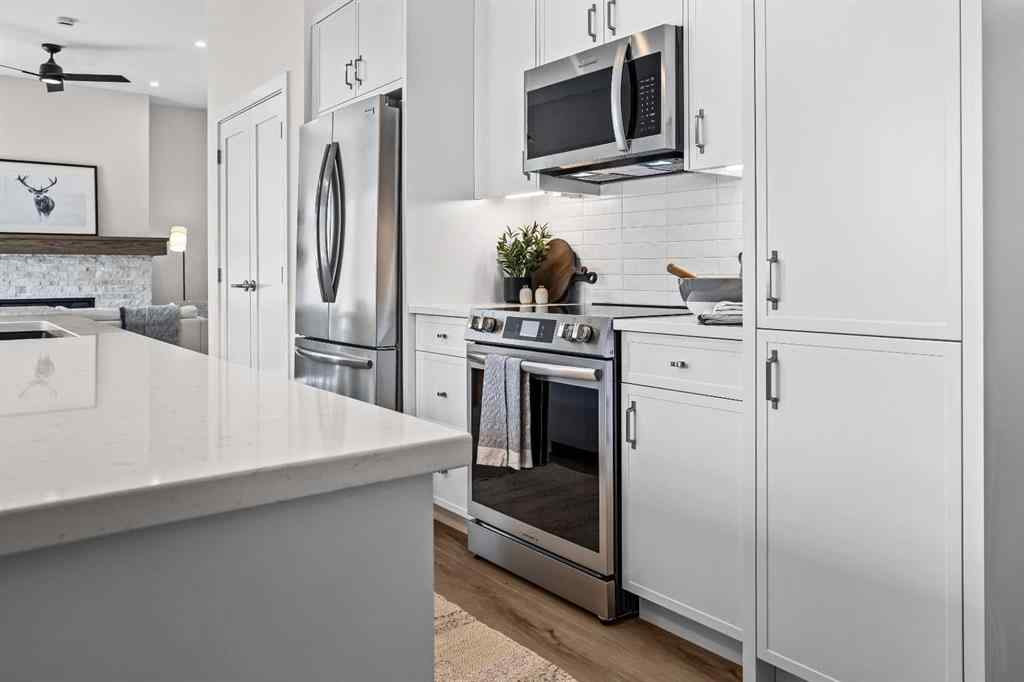 MLS® A2246086 - Unit #101L 209 Stewart Creek Rise  in Three Sisters Canmore, Residential