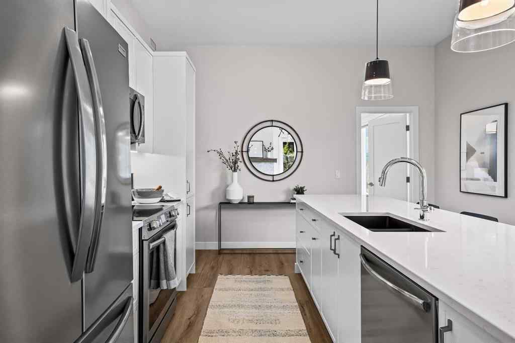 MLS® A2246086 - Unit #101L 209 Stewart Creek Rise  in Three Sisters Canmore, Residential