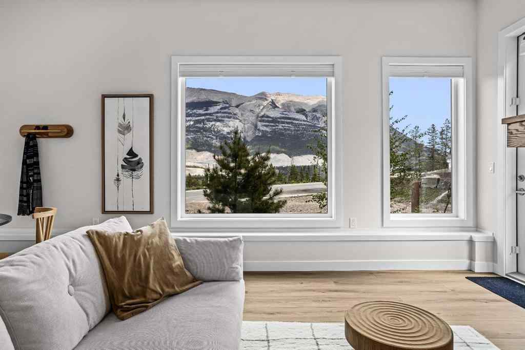 MLS® A2246086 - Unit #101L 209 Stewart Creek Rise  in Three Sisters Canmore, Residential