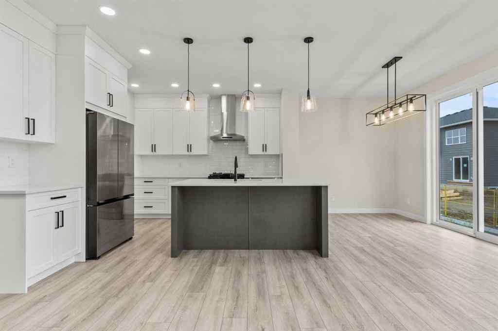 MLS® A2246091 - 354 Kinniburgh Loop  in Kinniburgh South Chestermere, Residential