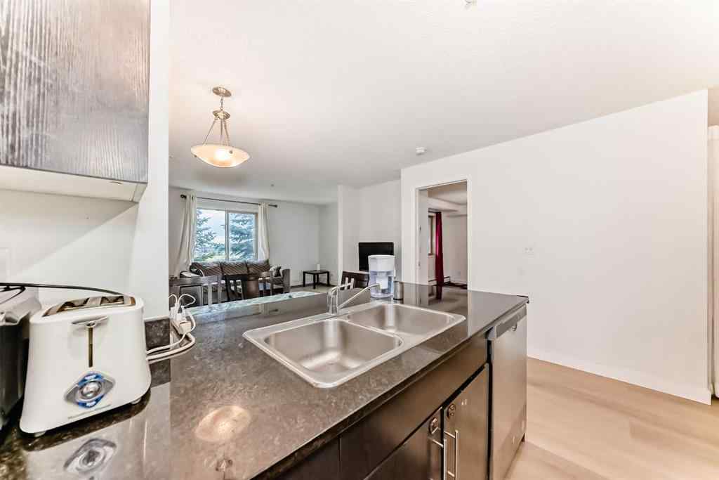 MLS® A2246099 - Unit #211 355 Taralake Way NE in Taradale Calgary, Residential