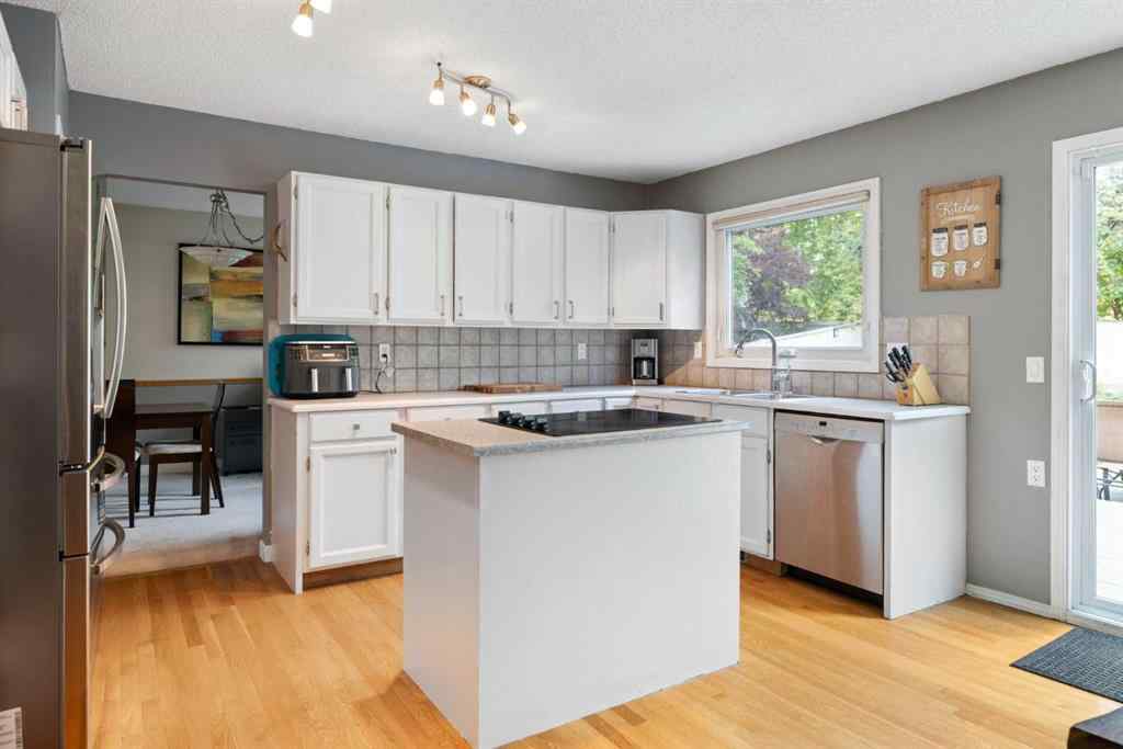 MLS® A2246103 - 156 Woodfield Road SW in Woodbine Calgary, Residential