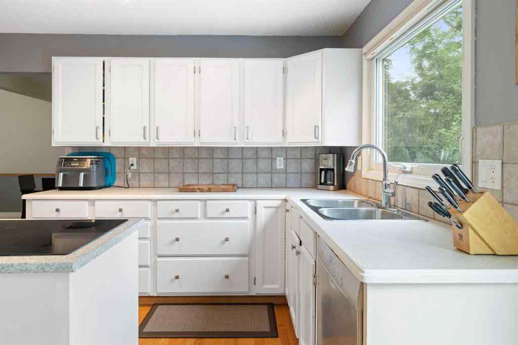 MLS® A2246103 - 156 Woodfield Road SW in Woodbine Calgary, Residential
