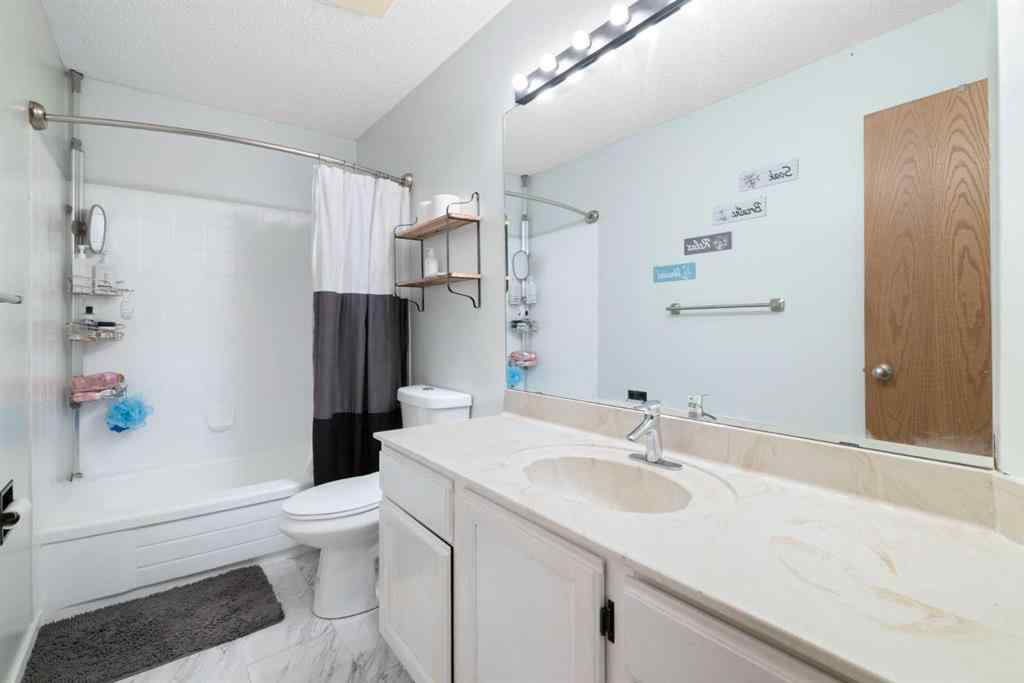 MLS® A2246103 - 156 Woodfield Road SW in Woodbine Calgary, Residential