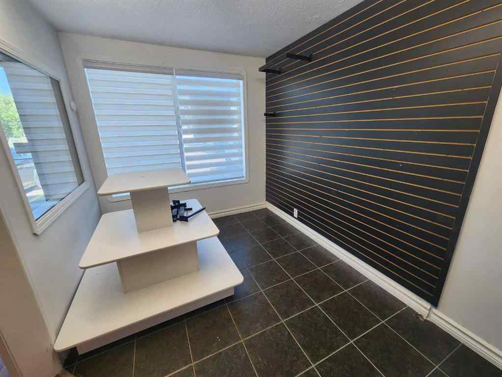 MLS® A2246158 - Unit #105 95 Brent Boulevard  in Crystal Ridge Strathmore, Commercial