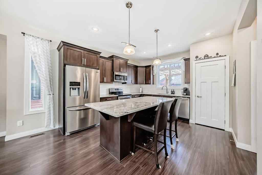 MLS® A2246162 - 222 Cooperswood Green SW in Coopers Crossing Airdrie, Residential
