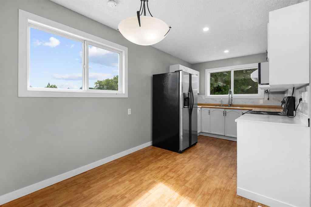 MLS® A2246163 - Unit #1 5520 1 Avenue SE in Penbrooke Meadows Calgary, Residential