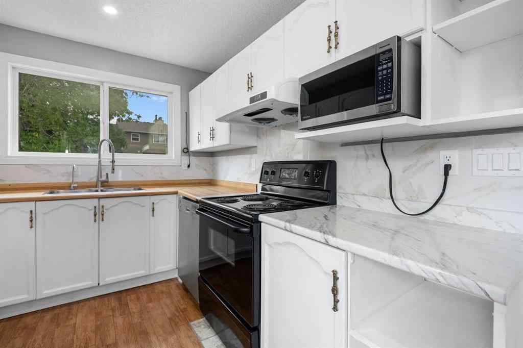 MLS® A2246163 - Unit #1 5520 1 Avenue SE in Penbrooke Meadows Calgary, Residential