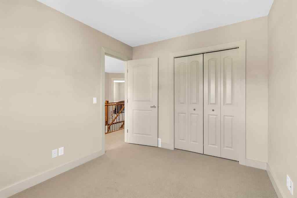 MLS® A2246175 - 68 Elmont Court SW in Springbank Hill Calgary, Residential