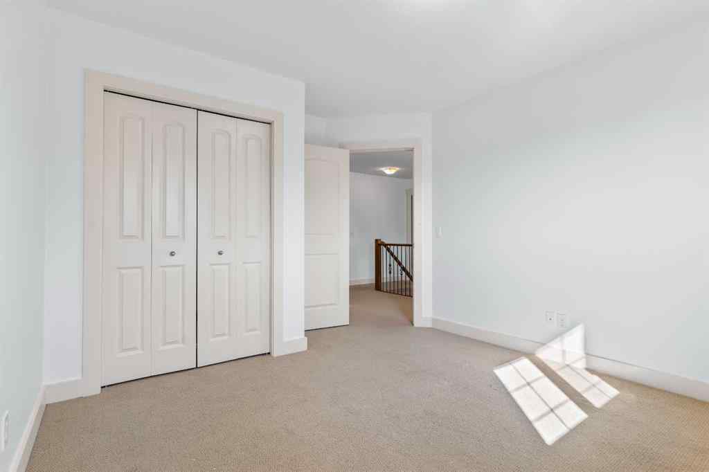 MLS® A2246175 - 68 Elmont Court SW in Springbank Hill Calgary, Residential