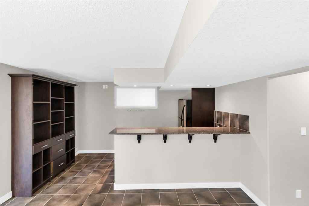 MLS® A2246175 - 68 Elmont Court SW in Springbank Hill Calgary, Residential