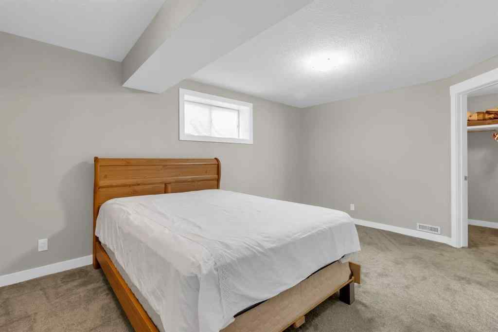 MLS® A2246175 - 68 Elmont Court SW in Springbank Hill Calgary, Residential