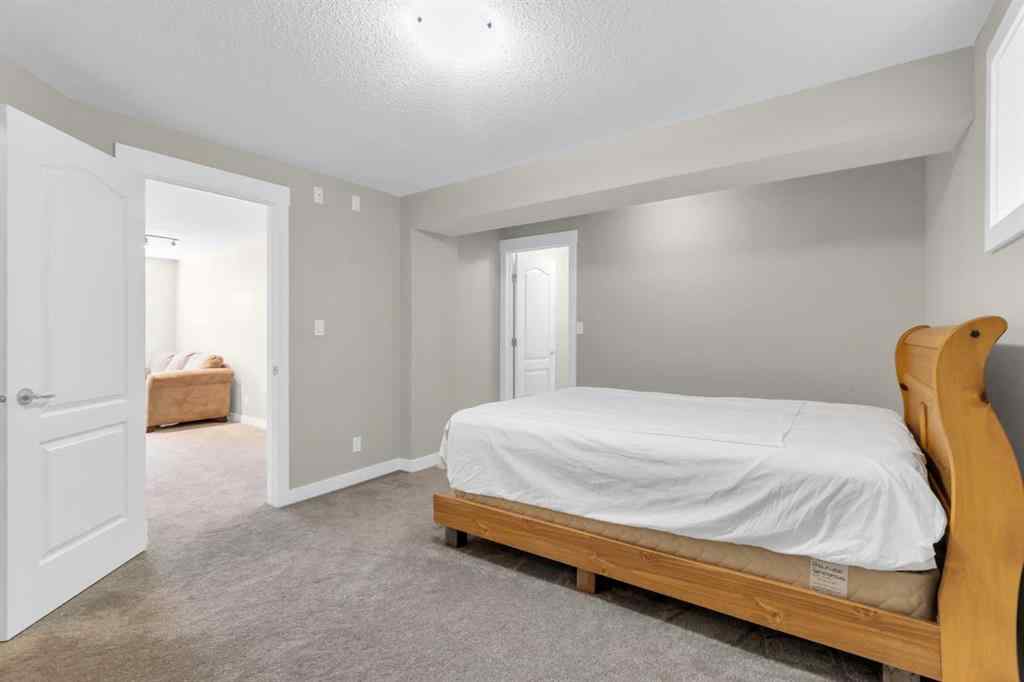 MLS® A2246175 - 68 Elmont Court SW in Springbank Hill Calgary, Residential