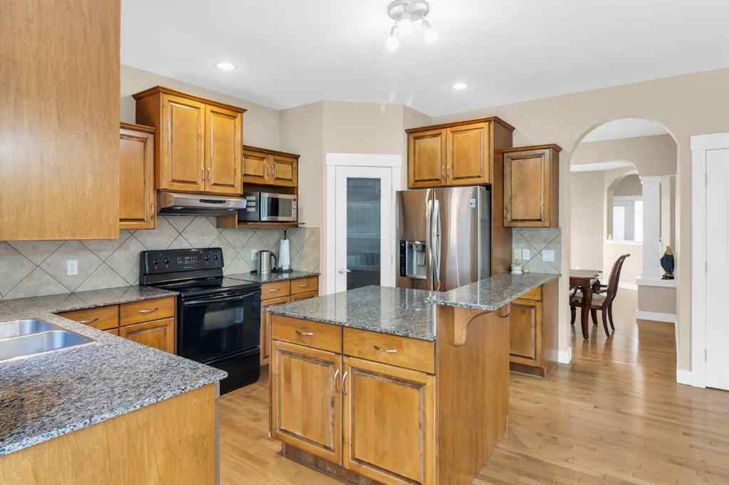 MLS® A2246175 - 68 Elmont Court SW in Springbank Hill Calgary, Residential