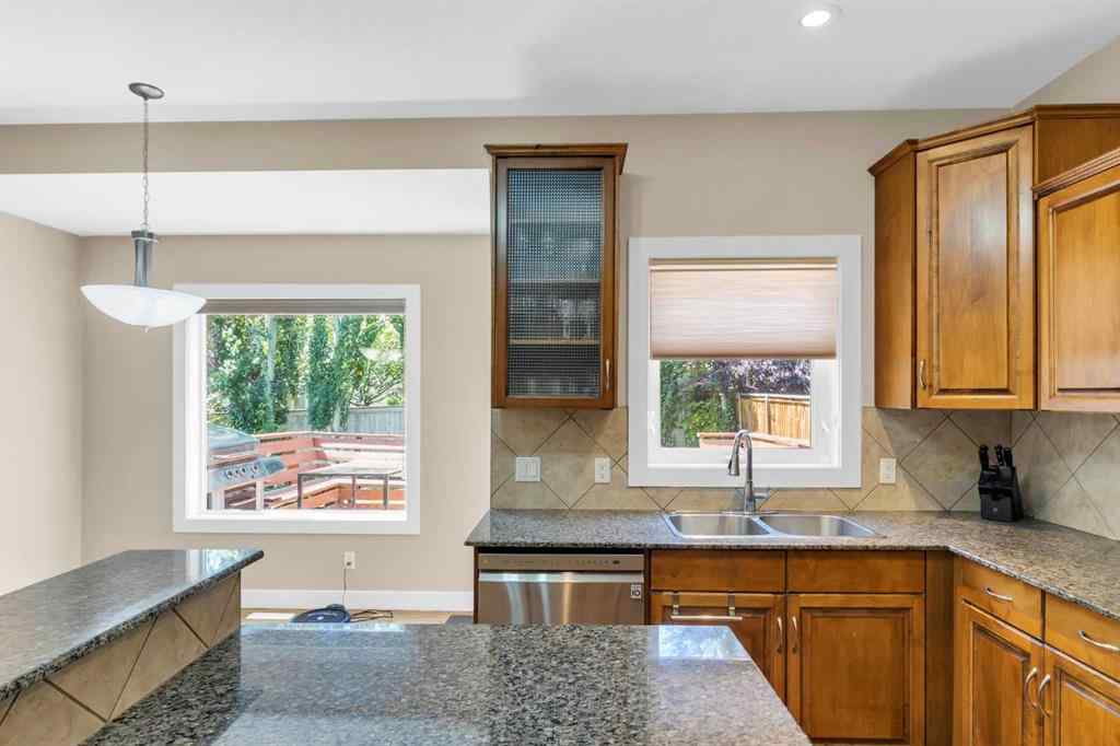 MLS® A2246175 - 68 Elmont Court SW in Springbank Hill Calgary, Residential