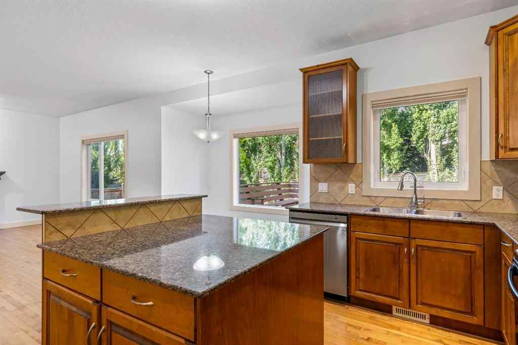 MLS® A2246175 - 68 Elmont Court SW in Springbank Hill Calgary, Residential