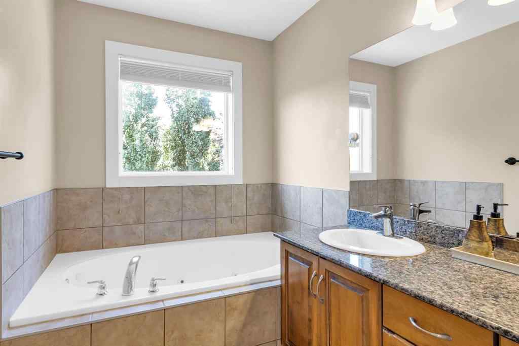 MLS® A2246175 - 68 Elmont Court SW in Springbank Hill Calgary, Residential