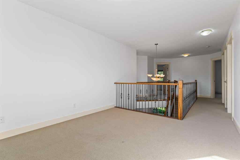 MLS® A2246175 - 68 Elmont Court SW in Springbank Hill Calgary, Residential