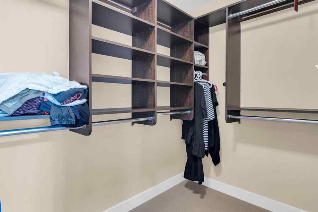 MLS® A2246175 - 68 Elmont Court SW in Springbank Hill Calgary, Residential